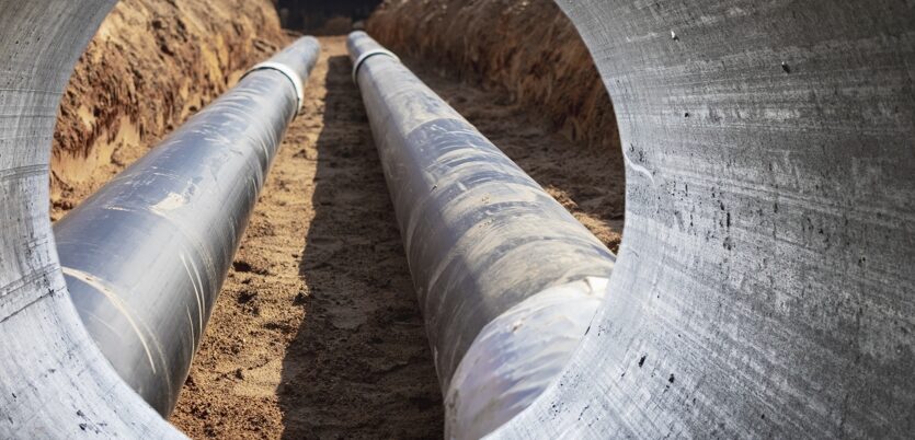 modern-water-supply-sewerage-system-undeddrground-pipeline-works-water-supply-wastewater-disposal-residential-city-closeup-underground-utilities-view-from-big-pipe dd